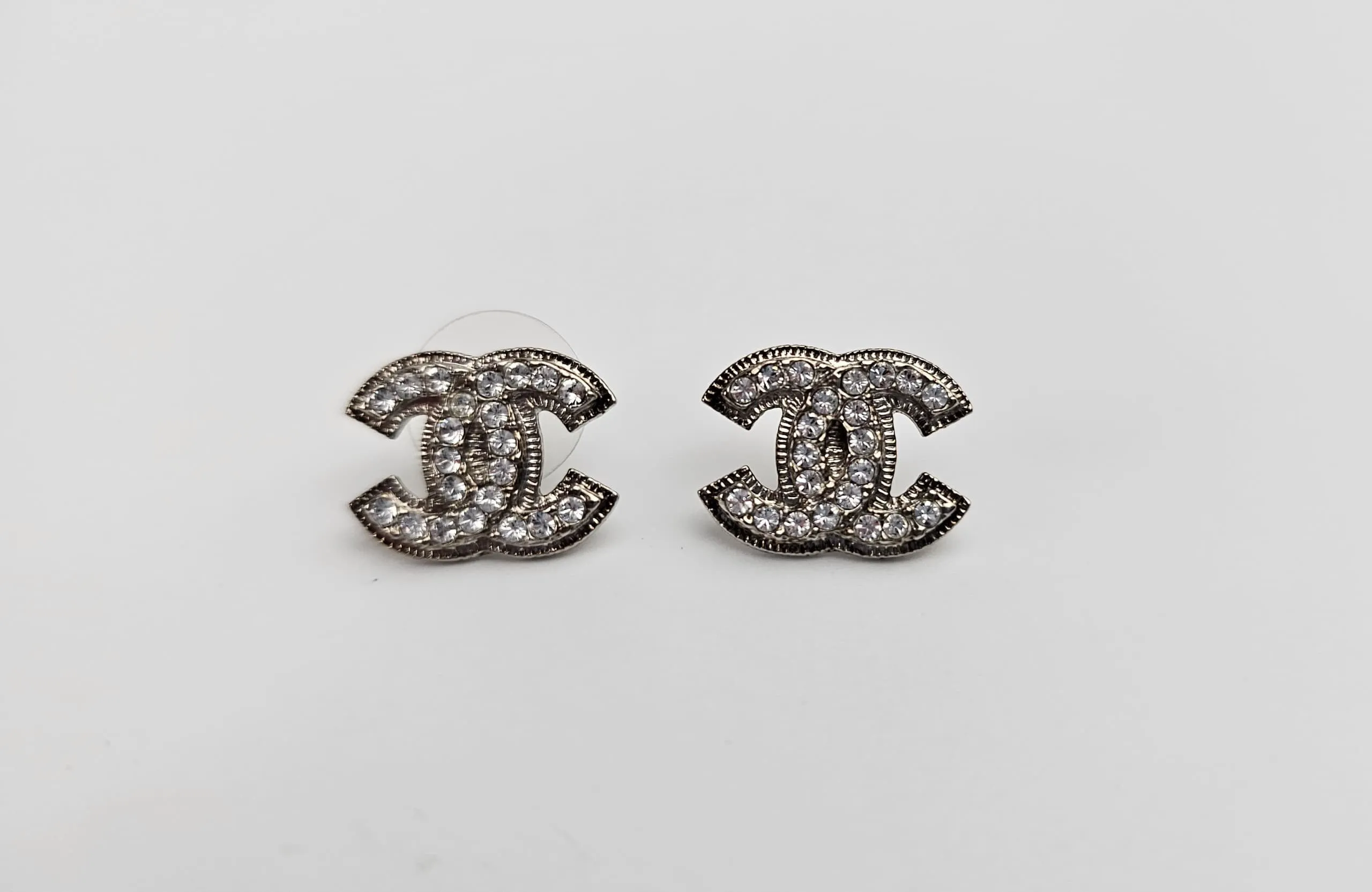 A26210 Logo Silver Crystal Earrings