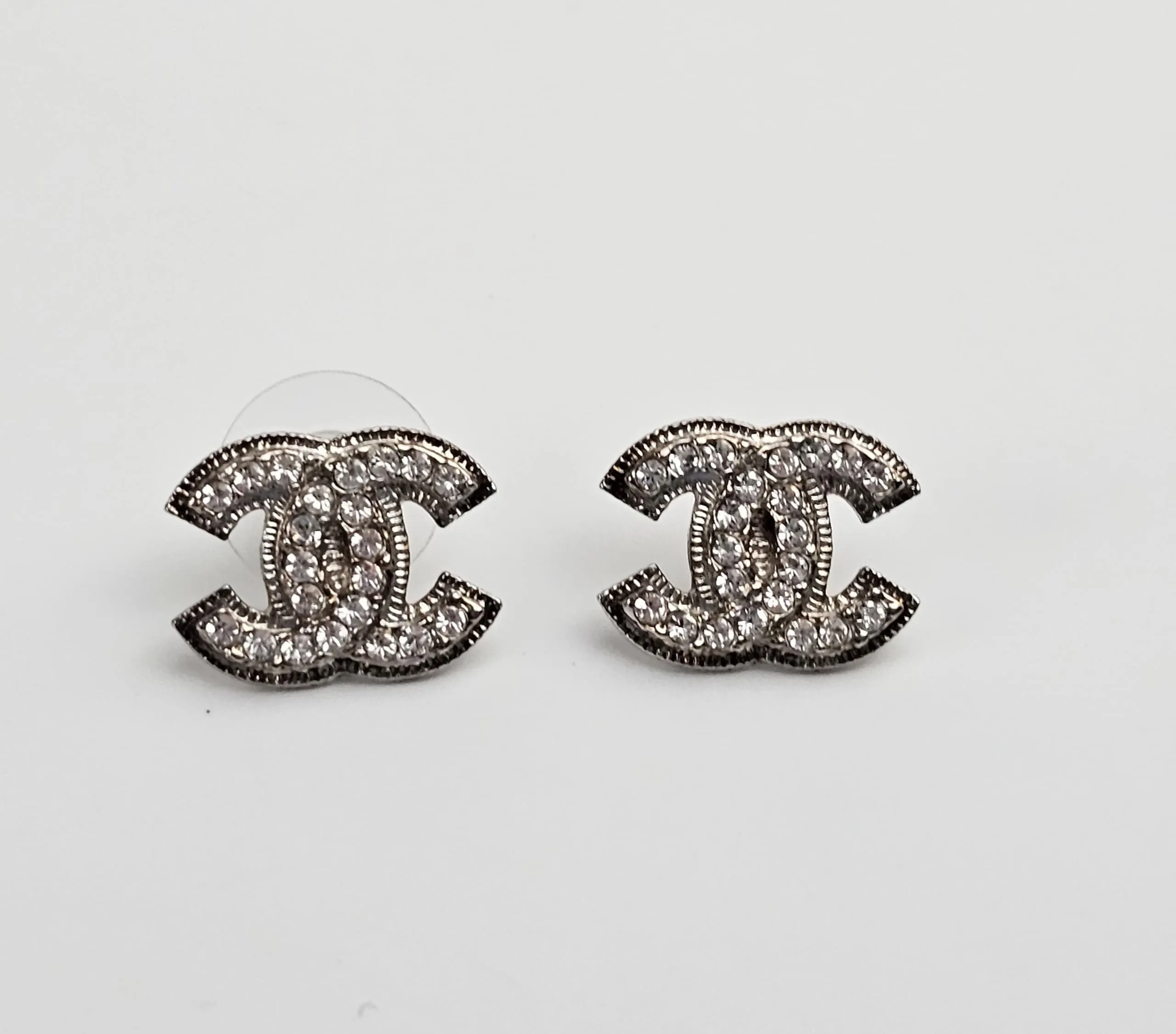 A26210 Logo Silver Crystal Earrings